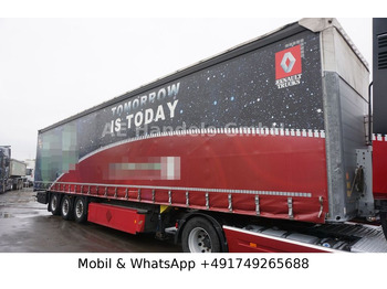 Semi-trailer dengan terpal samping SCHMITZ SCS