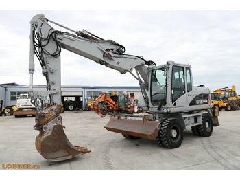 Ekskavator roda CATERPILLAR M313D