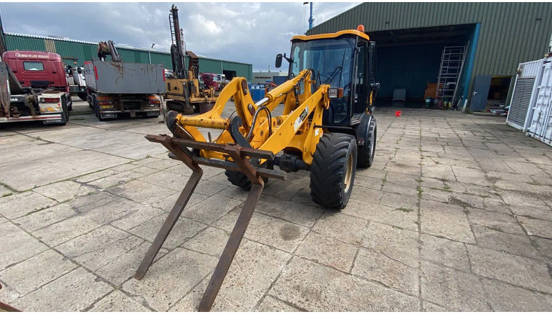 Wheel loader JCB KNIKSCHOVEL 406: gambar 10